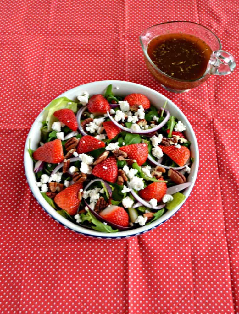Every holiday needs a fres side dish and this Strawberry Pecan Salad with Honey Balsamic Vinaigrette is a delicious (and easy to make) one!