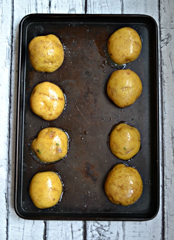 Bake golden potatoes to make them into Pulled Pork Potato Skins