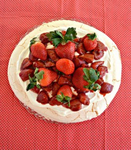 Need a crowd pleasing dessert? Try this light and delicious Roasted Strawberry Pavlova with Lemon Cream