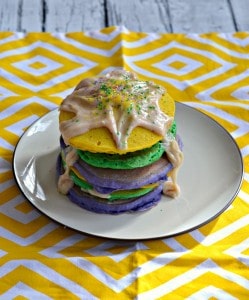 Want to celebrate Mardi Gras with breakfast? Enjoy these colorful and festive King Cake Pancakes with Cream Cheese Drizzle