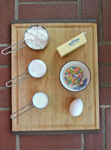 Everything you need to make Baked Vanilla Donuts with sprinkles!