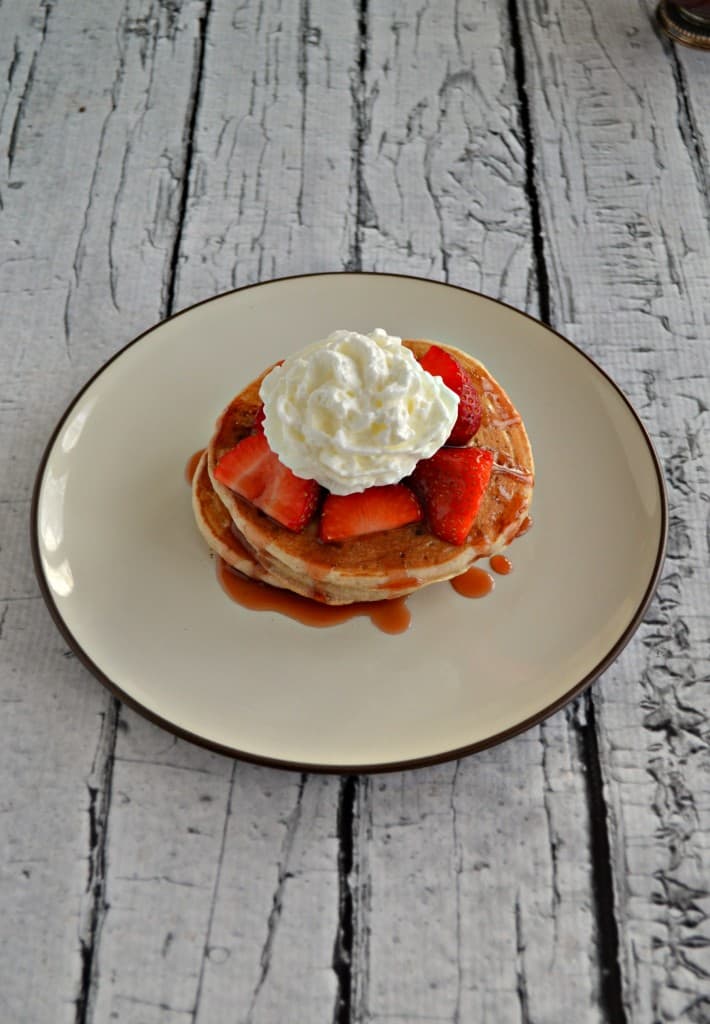 Love sweets for breakfast? Try these amazing Strawberry Shortcake Pancakes with homemade Strawberry Syrup!