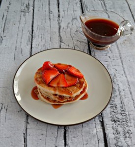 Treat your kids to a breakfast of Strawberry Shortcake Pancakes with homemade Strawberry Syrup