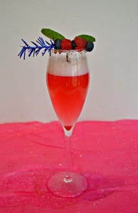Sip on this refreshing Sparkling Berry Cocktail with raspberries and blueberries!