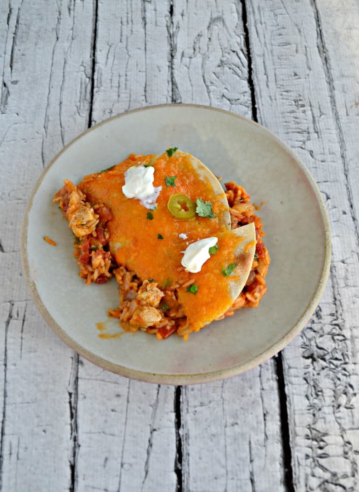 Love the flavors in this tasty One Pan Chicken Enchilada Rice Bake