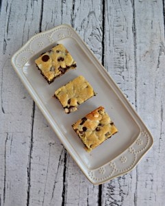 One bite and you'll be sold on these Fudge Filled Chocolate Chip Cookie Bars!