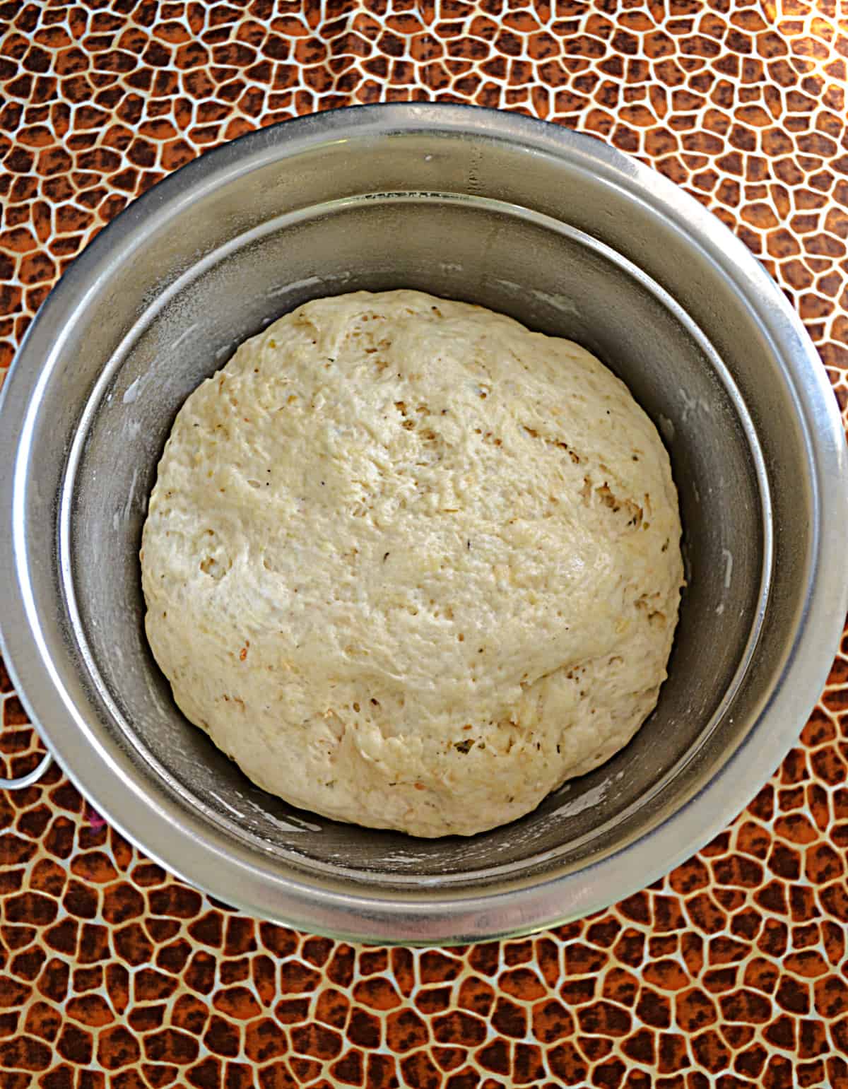 A bowl of bread dough.
