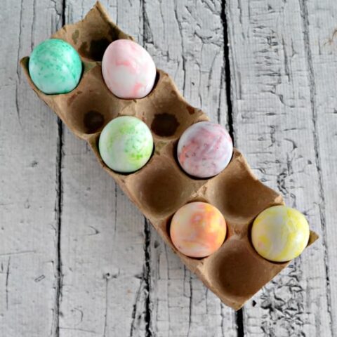 Looking for a new way to decorate Easter eggs? Try these pretty swirled Easter eggs with shaving cream!