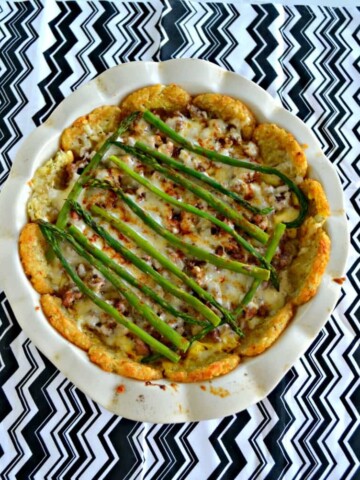 Having a brunch? One this awesome Hash Brown Crusted Casserole with Cheddaar, Eggs, and Asparagus!