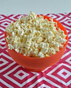 Looking for a quick and easy snack? Try this tasty Pizza Flavored Popcorn Recipe!