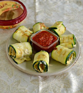 Kids and adults alike will enjoy these tasty Zucchini Roll Ups with Hummus and Mozzarella.