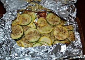 Grab some fresh zucchini and squash and grill them in these awesome Garlic Parmesan Packets!