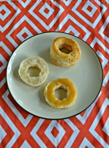 Layer peach filling between puff pastry rounds for delicious Puff Pastry Donuts