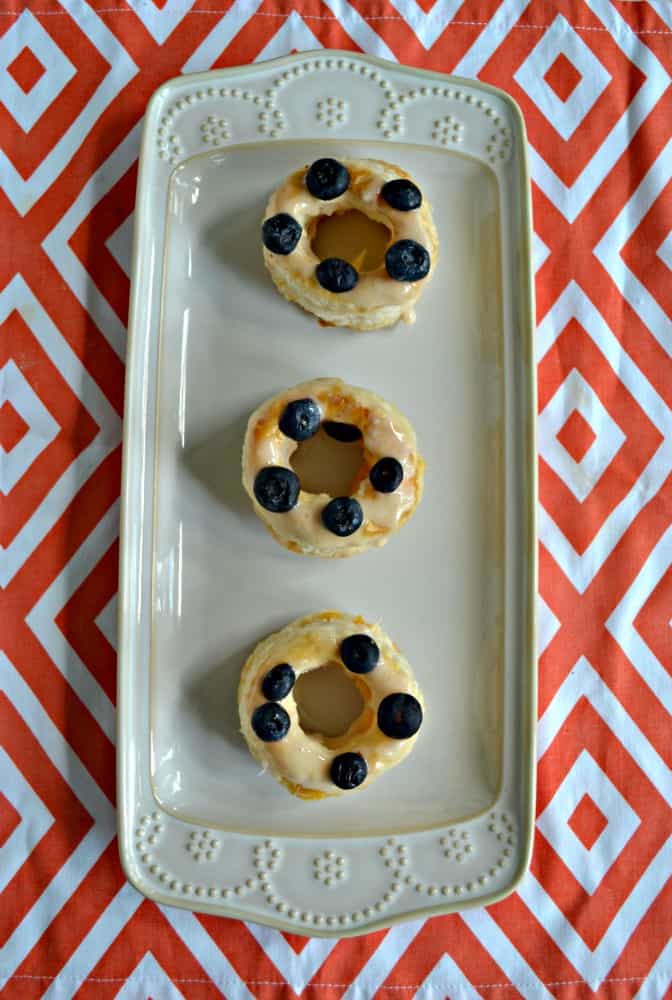 Love these easy Puff Pastry Peach Donuts with blueberries on top!