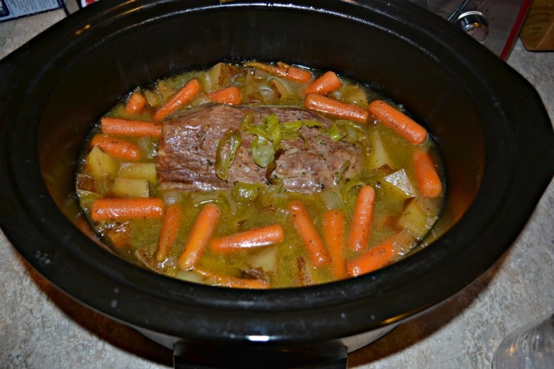 This tasty Slow Cooker Mississippi Roast takes just a few ingredients but packs a ton of flavor.