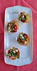 Looking for a fresh and healthy appetizer? Try these Chicken and Strawberry Caprese Wonton Cups!