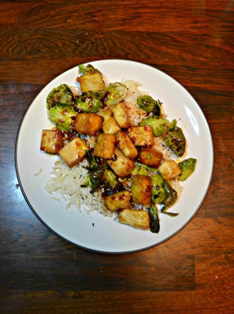 Need a flavorful meatless meal? Try this Crispy Tofu and Roasted Brussels Sprouts with Honey Sesame Glaze