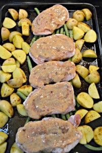 Chili Dijon Sauce makes these Sheet Pan Pork Chops and Potatoes sweet and spicy!