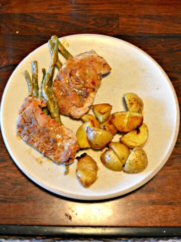 Love this Sheet Pan Chili Dijon Pork Chop meal with Potatoes and Green Beans