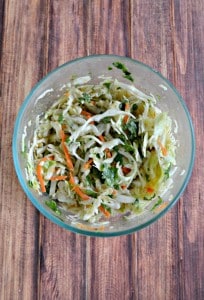 Fresh Cilantro Lime Slaw adds flavor to the Beer Battered Fish Tacos