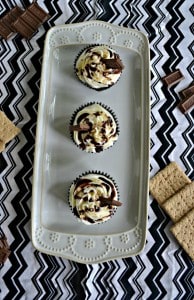 Chocolate Cupcakes filled with marshmallow and topped off with graham cracker crumbs and chocolate sauce!