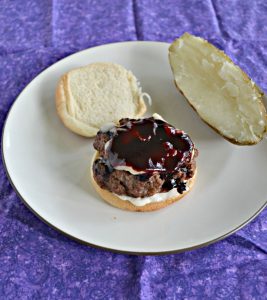 Burgers with Blueberry BBQ Sauce, Brie, and Lemon Shallot Aioli is a flavorful burger!