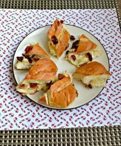 Grab yourself a plate and enjoy this Baked Brie, Bacon, and Cranberry Pull Apart Bread