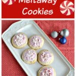 Pin Image: Text, a white platter topped with peppermint meltaway cookies with three Christmas bulbs beside it.