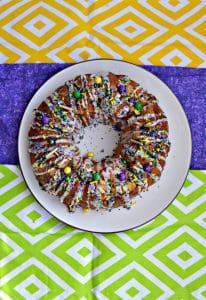 I love these fun sprinkles and cream cheese drizzle on this Mardi Gras Monkey Bread King Cake!