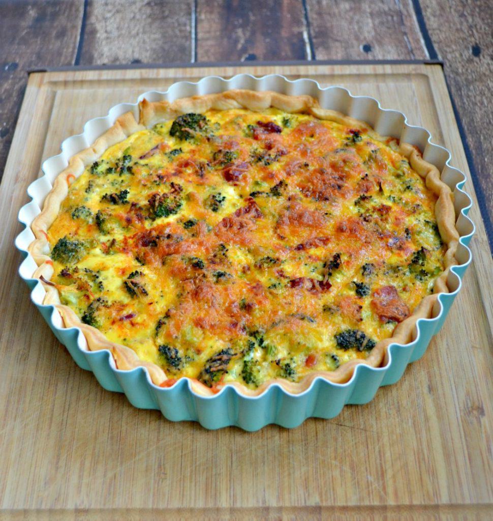 Looking for a quick and tasty weeknight meal? Give this Broccoli and Cheddar Quiche a try!
