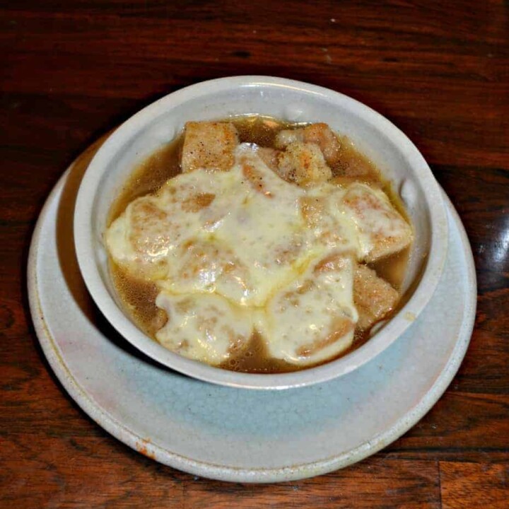 French Onion Soup topped with homemade croutons and Swiss Cheese