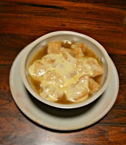 Warm up with a bowl of French Onion Soup topped with homemade croutons adn Swiss cheese