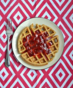 I can't get enough of these Vanilla Bean Waffles with Strawberry Sauce