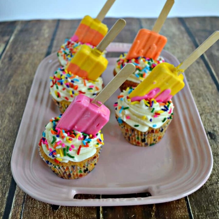 Summer is here and these Lemon Popsicle Cupcakes should be at your next party!