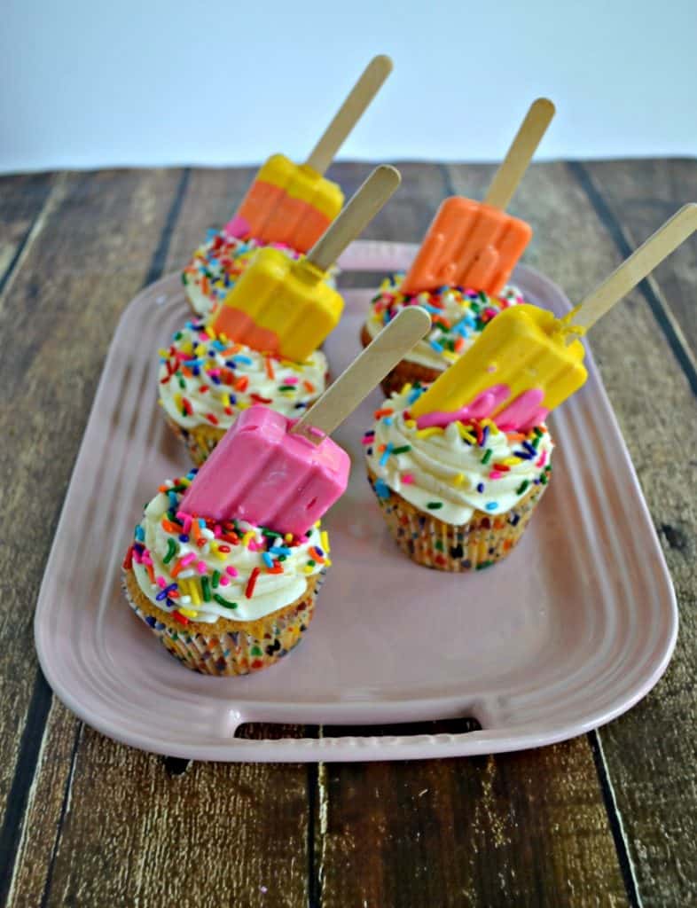 Summer is here and these Lemon Popsicle Cupcakes should be at your next party!