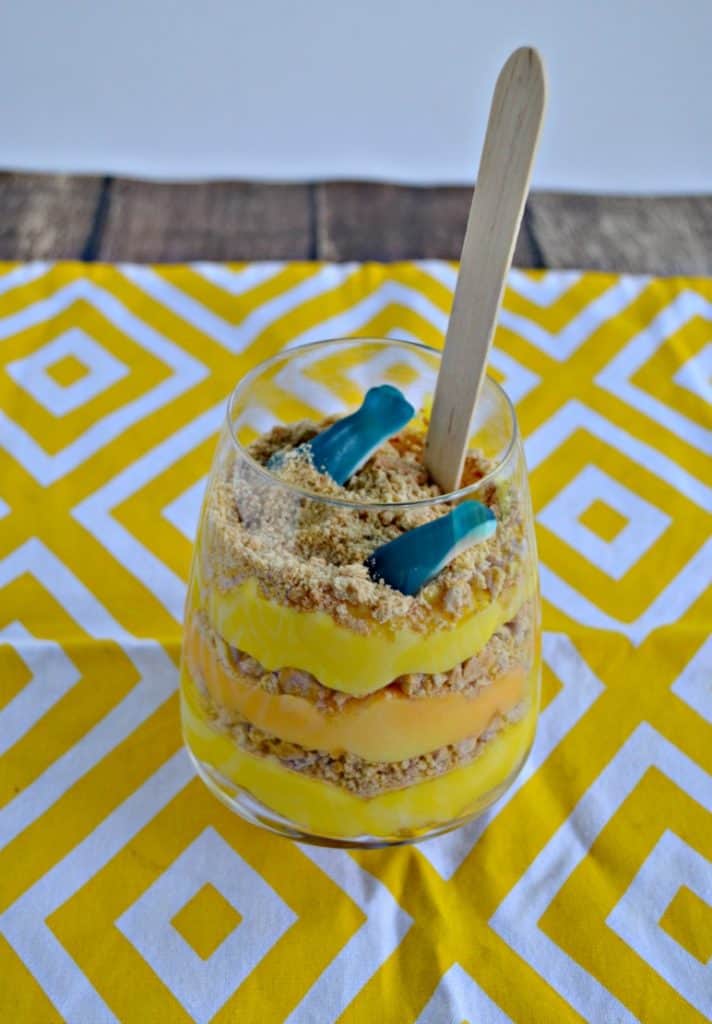 How fun are these Sun and Sand Pudding Cups with gummy sharks??