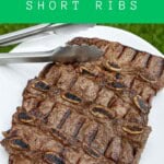 Pin Image: Title, A plate of short ribs on a platter with a pair of tongs nearby.
