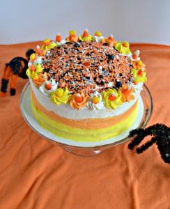 A top view of a Candy Corn Cake with sprinkles on top.