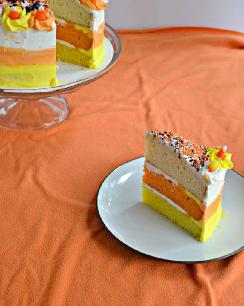 Having a Halloween party? This Candy Corn Layer Cake should be on your party list!