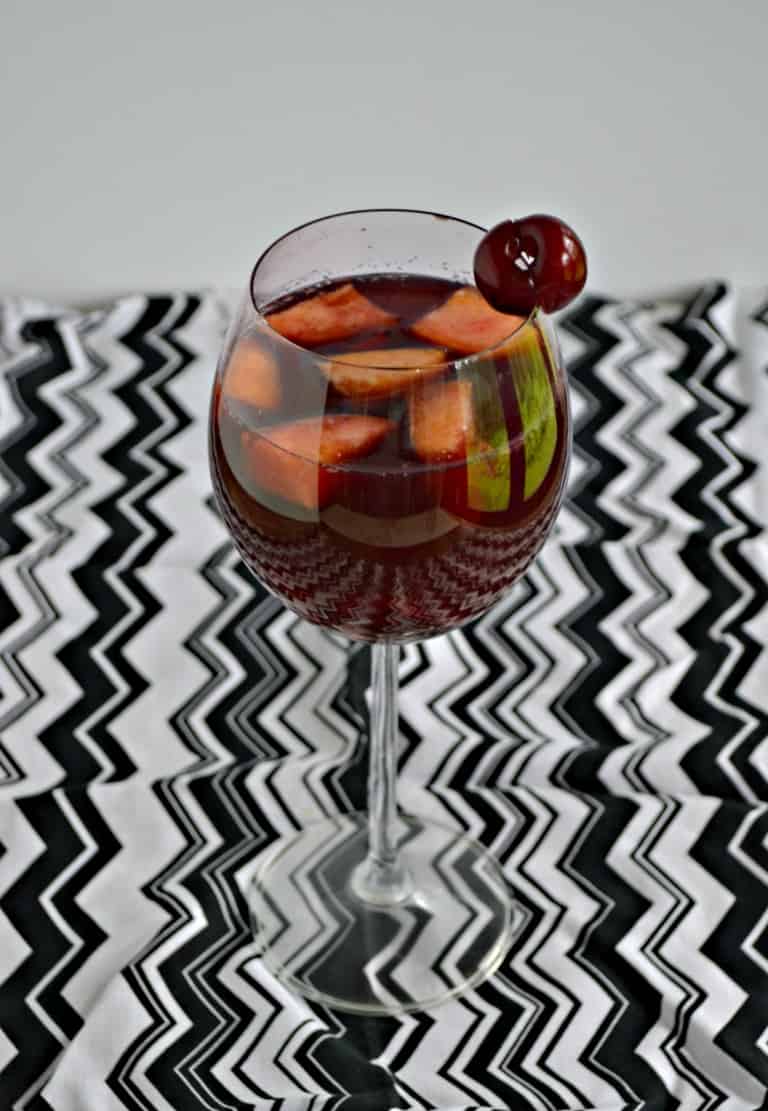 Peach Cherry Sangria is lightly sweetened and full of fruity flavors.