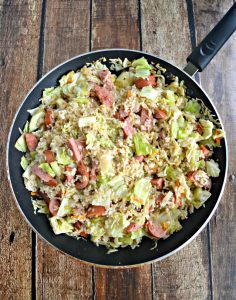 This heart Kielbasa and Cabbage Skilelt with Buttered Rice costs just $5, takes 20 minutes to make, and feeds a family of 4!