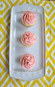 Lemon cupcakes with pink strawberry frosting