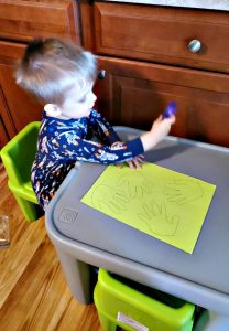 Tracing handprints for an Easy Carrot Craft