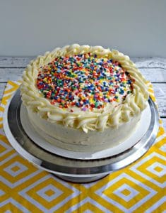 Cake with buttercream frosting and sprinkles