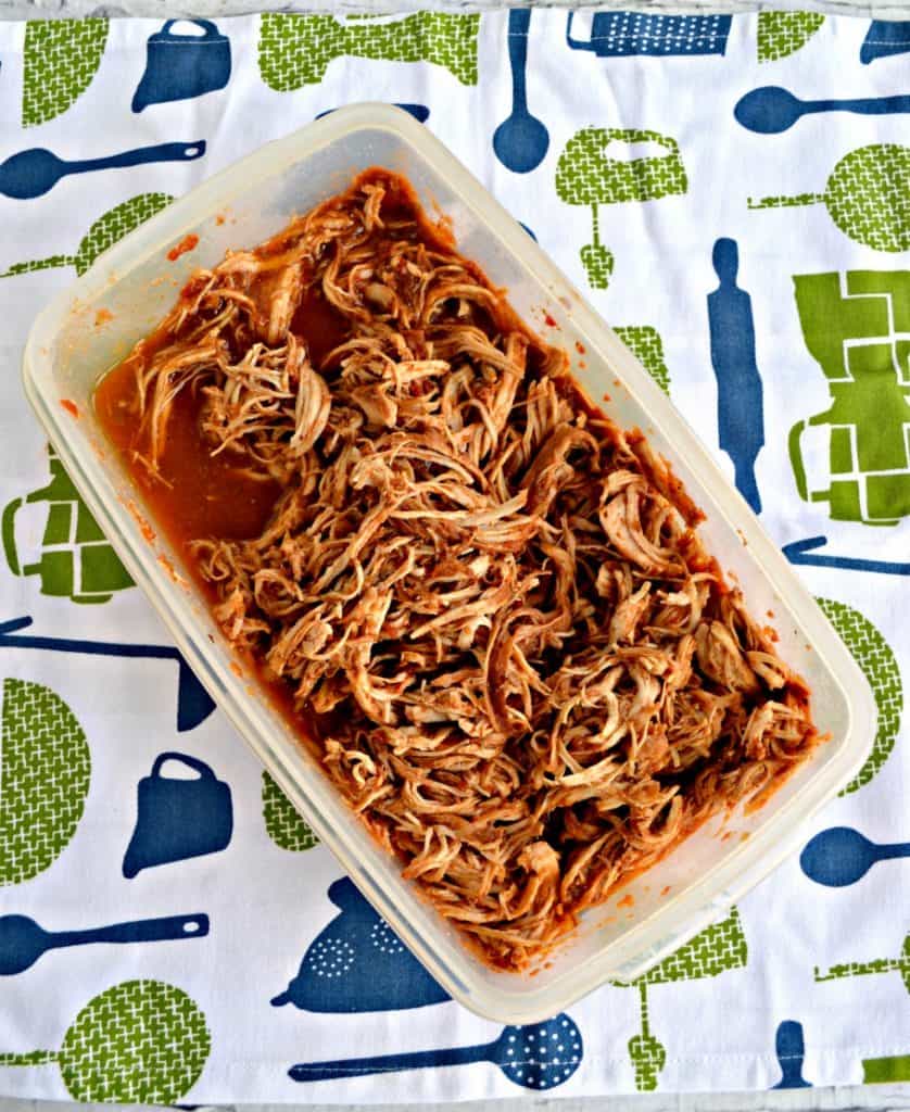 A container of shredded BBQ Chicken