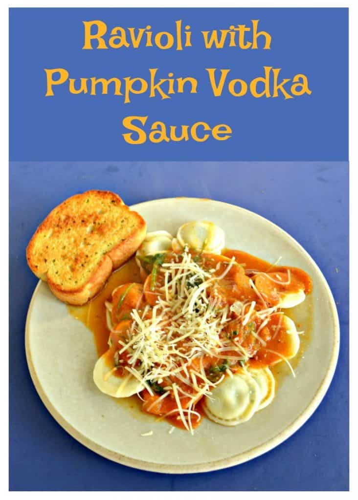 Pin Image:   Text Overlay, A white dish piled with ravioli in an orange cream sauce sprinkled with Parmesan cheese with a slice of garlic bread in the upper left hand corner of the plate all on a blue background.