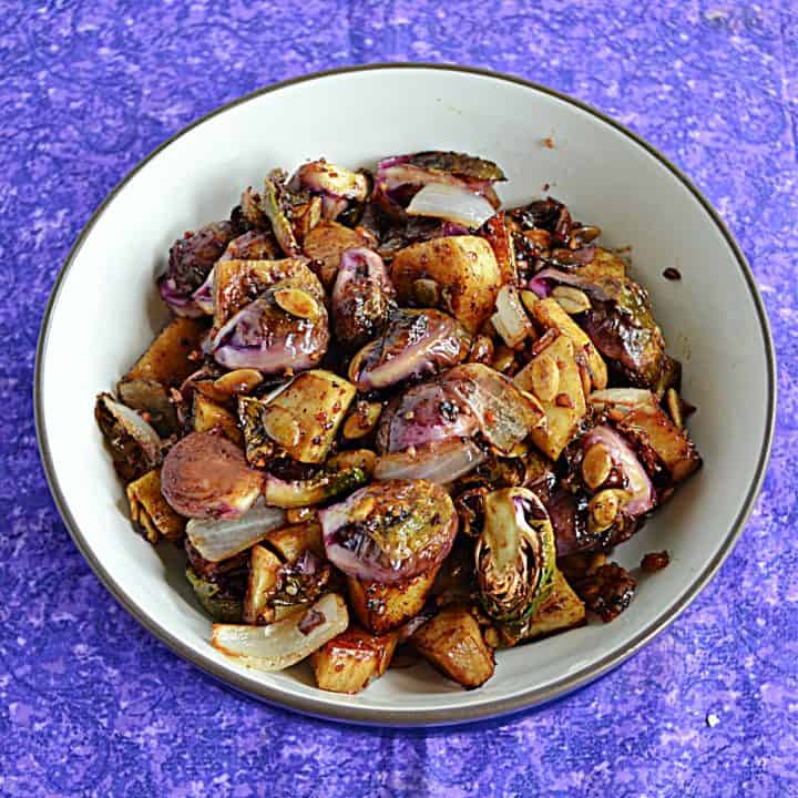 A bowl of Balsamic Brussels Sprouts and Sweet Potatoes.