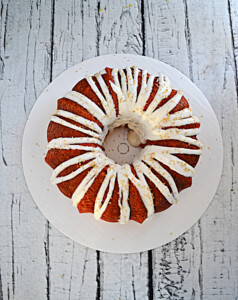 A Bundy Cake with white glaze drizzled on top.