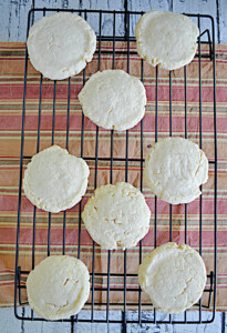 A cooling rack topped with sugar cookies