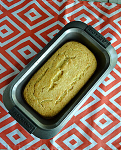 A bread pan filled with Orange Pound Cake